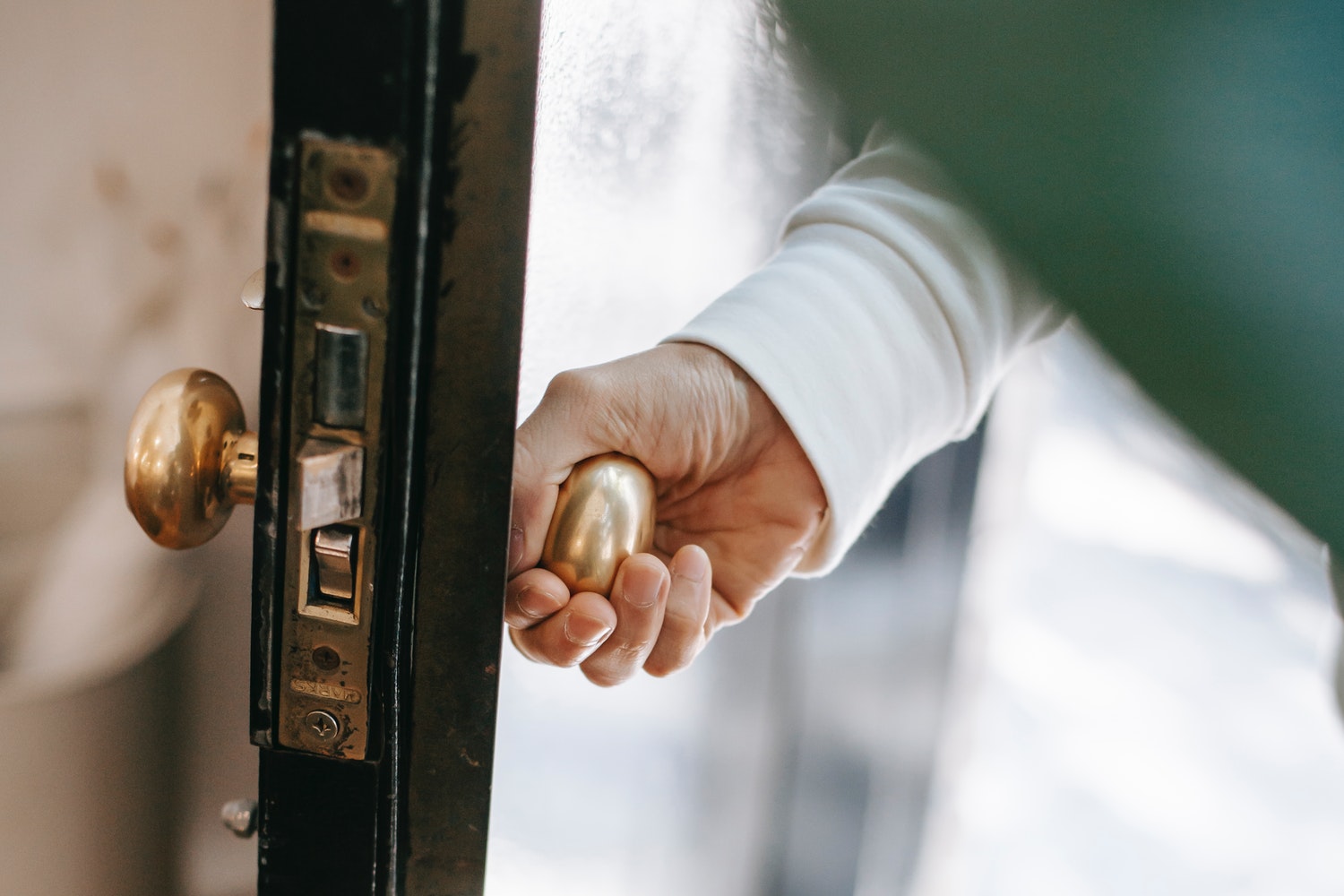 Banner of a person opening a door.